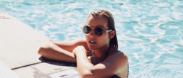 model in pool in Palm Springs