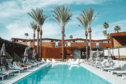 pool in Palm Springs with chairs around it