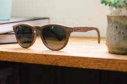 sunglasses propped up on table
