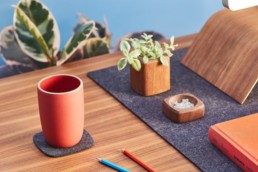 grovemade coaster and other products next to desk