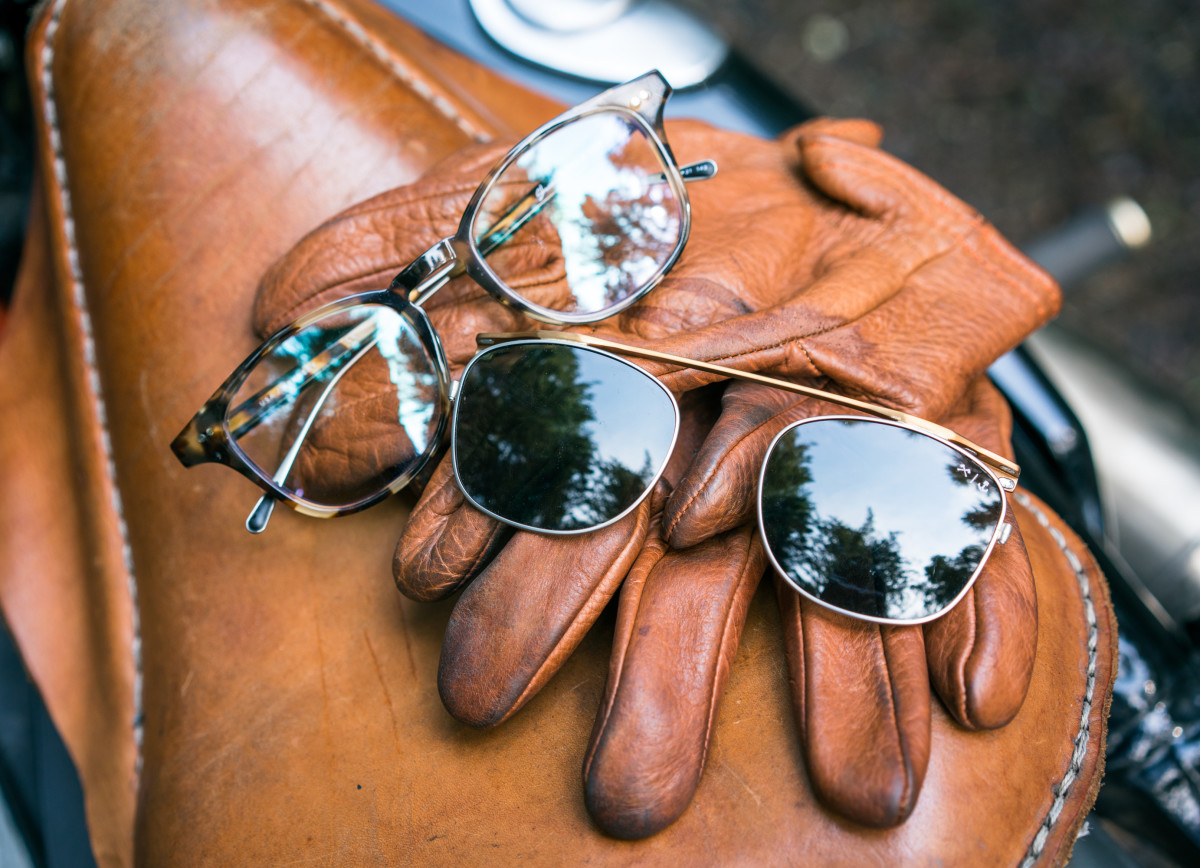 Shwood glasses on leather gloves